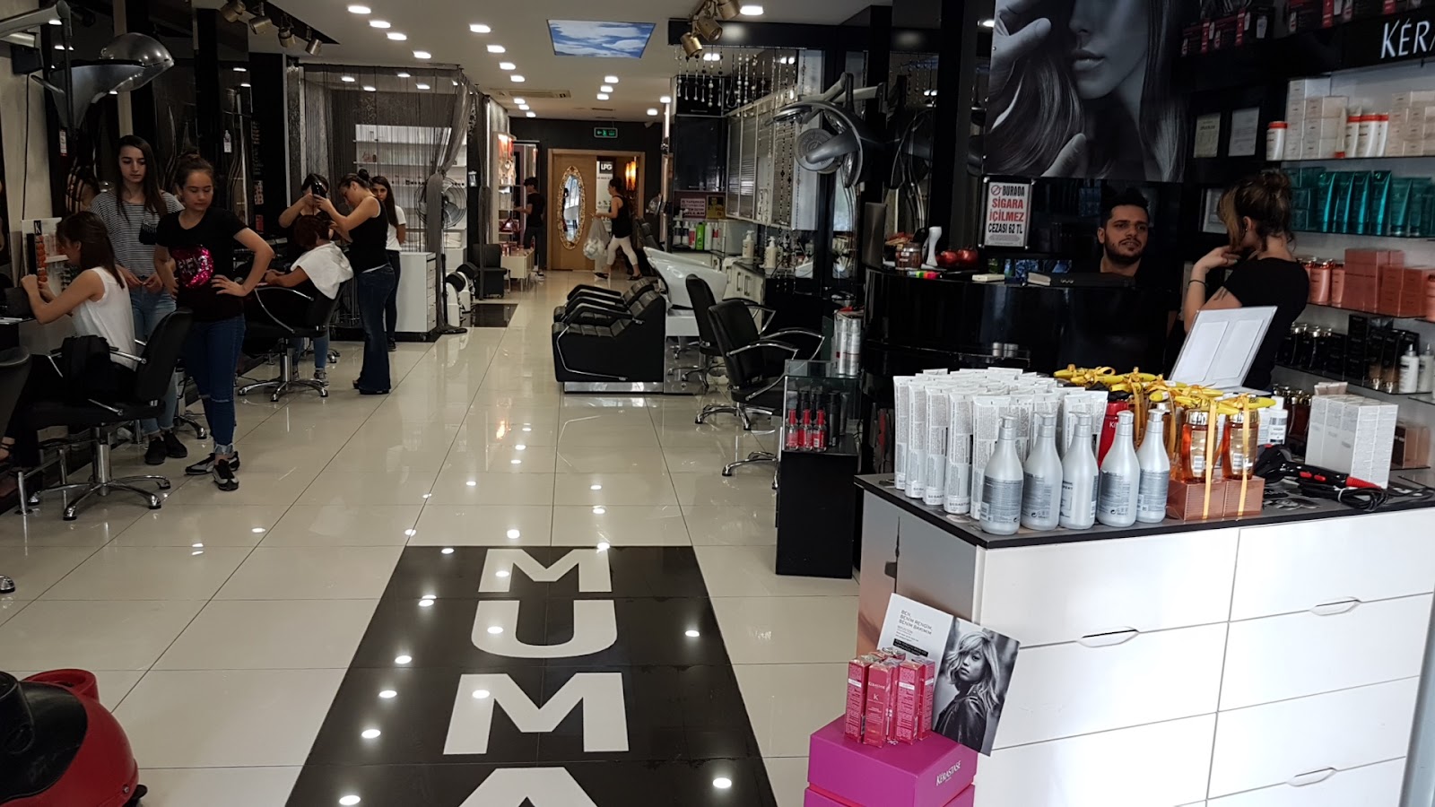 Mumans Barber & Beauty Center